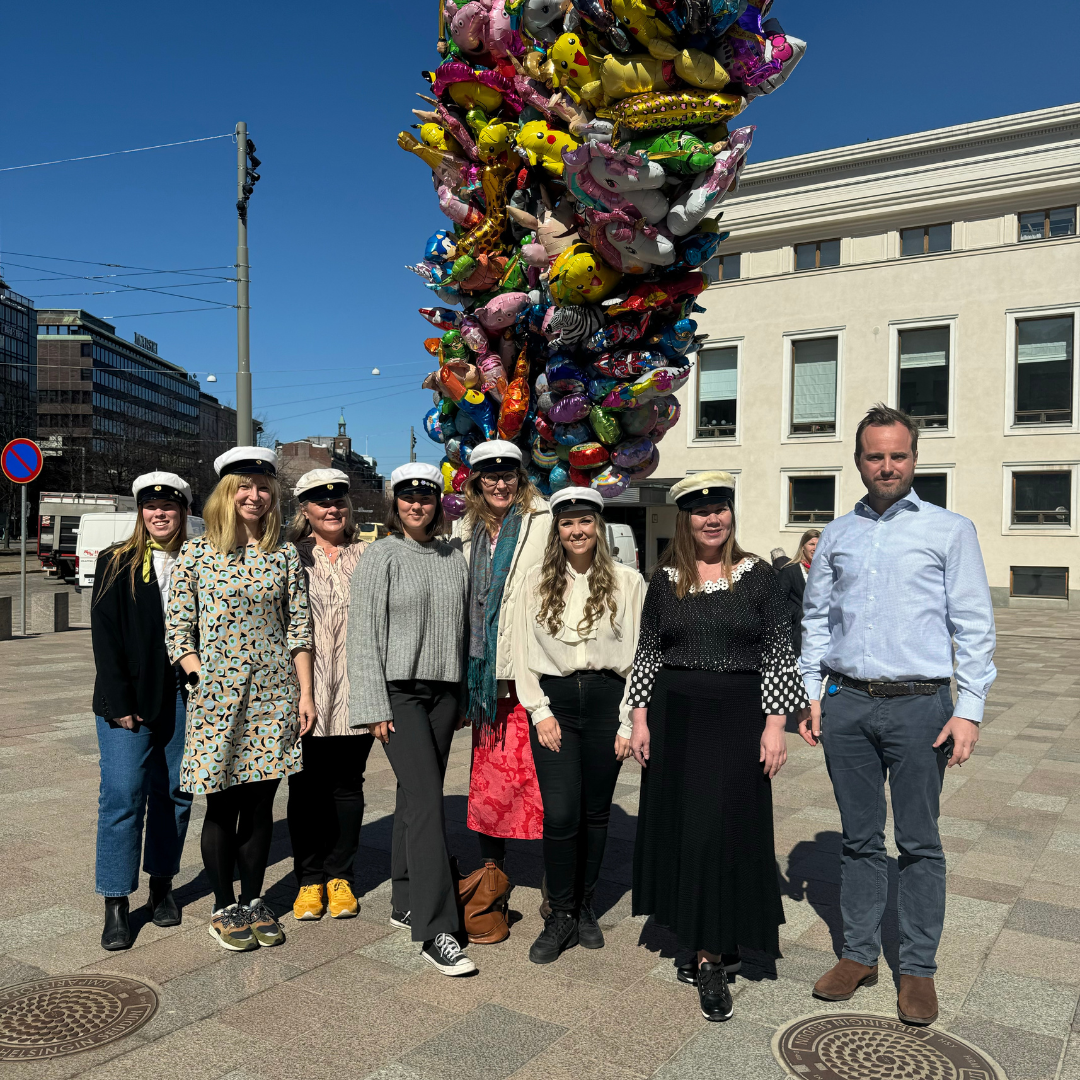 Staff pictures in students caps